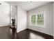 Bright living room featuring dark wood floors and lots of natural light at 2855 Pilgrim Mill, Cumming, GA 30041