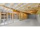 Unfinished basement with wooden framing, insulation and concrete floor at 2855 Pilgrim Mill, Cumming, GA 30041