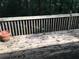 Spacious backyard wooden deck, a great space to relax and enjoy the outdoors at 318 Bakers Bridge Cir, Douglasville, GA 30134