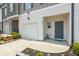 Close up exterior with a one car garage and small garden in front of property at 3481 Lakeview Crk, Lithonia, GA 30038