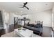 Open concept living room with sleek hardwood floors and modern finishes at 3481 Lakeview Crk, Lithonia, GA 30038