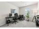 Bright home office with natural light, dual desks and neutral paint color at 3481 Lakeview Crk, Lithonia, GA 30038