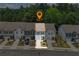 Street view of townhouses with front lawns, driveways, garages and car parked on the street at 3481 Lakeview Crk, Lithonia, GA 30038
