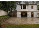 Brick patio with a home exterior with black framed windows at 3916 E Brookhaven Ne Dr, Brookhaven, GA 30319