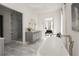 Bathroom features a soaking tub, glass shower, vanity with marble countertop and doorway to bedroom at 3916 E Brookhaven Ne Dr, Brookhaven, GA 30319