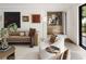 Well-appointed living room with curated art, modern furniture, and stylish decor at 3916 E Brookhaven Ne Dr, Brookhaven, GA 30319