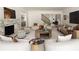 Open-concept living room with a marble fireplace and stylish modern decor at 3916 E Brookhaven Ne Dr, Brookhaven, GA 30319