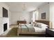 Spacious main bedroom boasts a fireplace and bright windows at 3916 E Brookhaven Ne Dr, Brookhaven, GA 30319