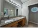 Bathroom featuring double sinks, granite countertops, a soaking tub, and a separate shower at 1415 Stoney Field Pl, Lawrenceville, GA 30043