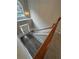 Bright foyer with high ceilings, large arched window, and modern light fixture overlooking the front door at 1415 Stoney Field Pl, Lawrenceville, GA 30043