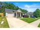 Home with a well-maintained lawn, covered porch, and attached garage, perfect for a Gathering at 175 Orchard Ln, Covington, GA 30014