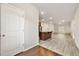 Modern kitchen with stainless steel appliances and a center island, open to the living area at 175 Orchard Ln, Covington, GA 30014