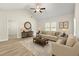Comfortable living room with stylish furniture, neutral tones, and great natural light at 175 Orchard Ln, Covington, GA 30014