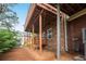 Backyard with a multi-level wooden deck showcasing access to both the first and second floors at 451 Tioram Se Ln, Smyrna, GA 30082