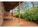 The backyard featuring wooden deck pillars and plenty of room to relax and play at 451 Tioram Se Ln, Smyrna, GA 30082