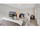 Comfortable living room with neutral tones, a large sectional couch, and a TV at 451 Tioram Se Ln, Smyrna, GA 30082