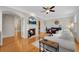 Open-concept living room with fireplace, hardwood floors, and plenty of space for entertaining at 451 Tioram Se Ln, Smyrna, GA 30082