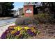 Highlands View community sign, set against a backdrop of colorful flowers at 451 Tioram Se Ln, Smyrna, GA 30082