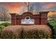 Highlands View community sign on a brick structure surrounded by lush landscaping at 451 Tioram Se Ln, Smyrna, GA 30082