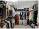 Large walk-in closet with custom shelving and storage solutions for all wardrobes at 451 Tioram Se Ln, Smyrna, GA 30082