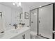 Modern bathroom featuring a glass-enclosed shower and sleek fixtures at 518 Hargrove Ln, Decatur, GA 30030