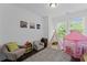 Charming bedroom for with a play tent and decor accents at 518 Hargrove Ln, Decatur, GA 30030