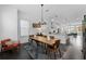 Bright dining area featuring an open layout, modern chandelier, and stylish decor at 518 Hargrove Ln, Decatur, GA 30030