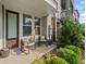 Charming front porch with seating, providing a welcoming entrance to the home at 518 Hargrove Ln, Decatur, GA 30030