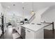 Kitchen with quartz counters, stainless steel appliances, hardwood floors, and open-concept design at 518 Hargrove Ln, Decatur, GA 30030