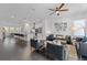 Open concept living room features hardwood floors, modern furniture, and easy access to the kitchen at 518 Hargrove Ln, Decatur, GA 30030