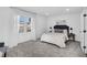 Cozy bedroom with carpet, a plush bed, and modern decor at 1536 Daffodil Drive, Marietta, GA 30062