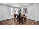 Bright dining room featuring a wooden table with seating and a large window at 1536 Daffodil Drive, Marietta, GA 30062