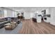 Open concept: living, dining, and kitchen with hardwood flooring and lots of natural light at 1536 Daffodil Drive, Marietta, GA 30062