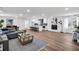 Spacious living room: hardwood flooring, brick fireplace, open to the kitchen at 1536 Daffodil Drive, Marietta, GA 30062