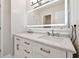 Bright bathroom with double sink vanity, marble countertop, and illuminated mirror at 9811 Spyglass Dr, Villa Rica, GA 30180