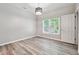 A cozy bedroom offering lots of light and updated flooring at 9811 Spyglass Dr, Villa Rica, GA 30180