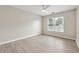 A bright bedroom with updated flooring, trim, and paint at 9811 Spyglass Dr, Villa Rica, GA 30180