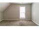 Bedroom with carpet, a window with blinds, and neutral colored walls at 12015 Harbour Town Pkwy, Fayetteville, GA 30215