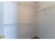 Walk-in closet with adjustable shelving for storage and organization of clothes and accessories at 12015 Harbour Town Pkwy, Fayetteville, GA 30215