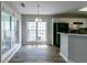 Sunlit dining area with multiple windows at 12015 Harbour Town Pkwy, Fayetteville, GA 30215