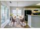 Bright dining area featuring large windows and a round table with seating at 12015 Harbour Town Pkwy, Fayetteville, GA 30215