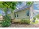 Back exterior view of home with a walkout basement, siding and a wooden deck at 12015 Harbour Town Pkwy, Fayetteville, GA 30215