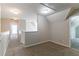 Second floor hallway with carpet flooring and access to the bonus room and other rooms at 12015 Harbour Town Pkwy, Fayetteville, GA 30215
