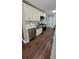 Well-lit kitchen features stainless steel appliances, white cabinets, and modern countertops at 462 Center Hill Ave, Atlanta, GA 30318