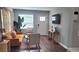 Cozy living room features wood floors, neutral walls, modern furnishings, and great natural light at 462 Center Hill Ave, Atlanta, GA 30318