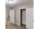 Bright bedroom boasts modern flooring, neutral paint, and ample closet space at 568 Mcwilliams Se Rd, Atlanta, GA 30315