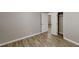 Bedroom with wood-look floors and two doors at 568 Mcwilliams Se Rd, Atlanta, GA 30315