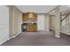 A finished basement features a wet bar with a wine fridge and additional cabinetry at 1304 Swallows Walk, Grayson, GA 30017
