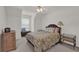Inviting bedroom with a cozy queen bed, soft lighting, and a relaxing atmosphere at 1304 Swallows Walk, Grayson, GA 30017