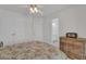 Spacious bedroom with neutral tones, double closets, and an en suite bathroom at 1304 Swallows Walk, Grayson, GA 30017